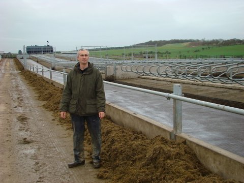 Rory Christie in front of his new outdoor winter cow cubicle accomodation.